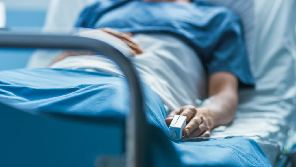 Person WithCritical Illness in Hospital Bed
