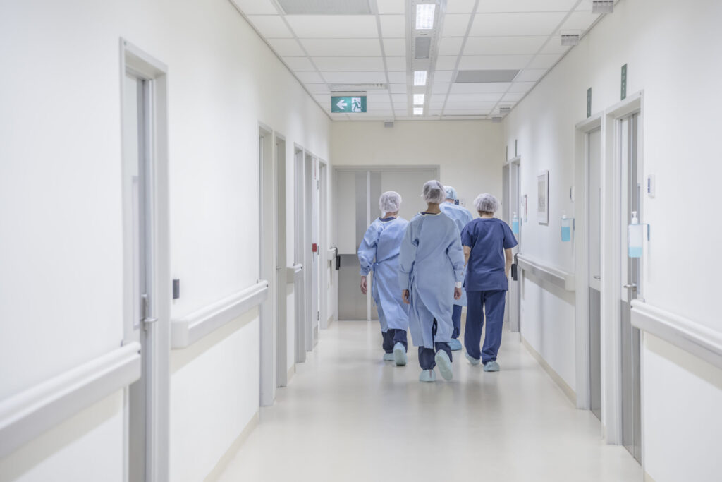 Nurses Walking in Hospital Corridor - Hospital Negligence