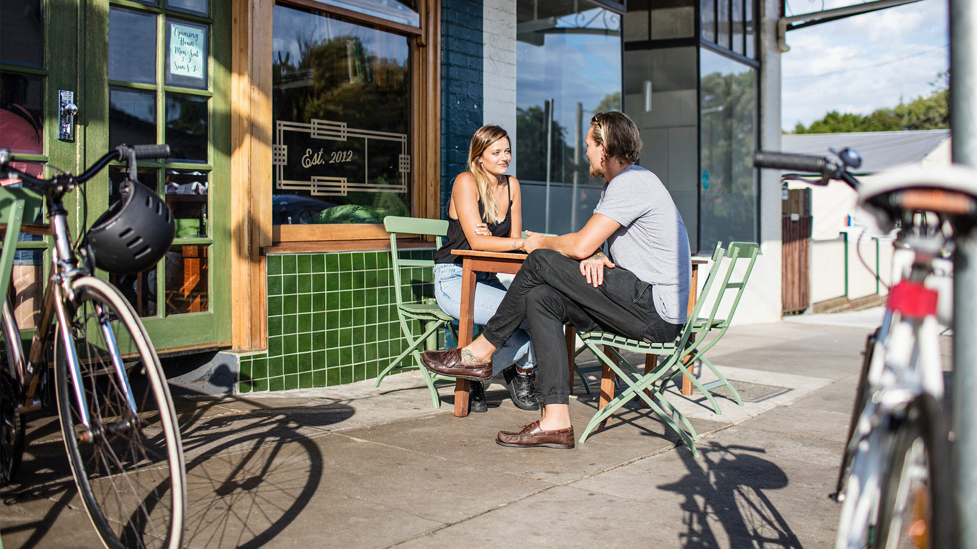 Couple Sitting outside café