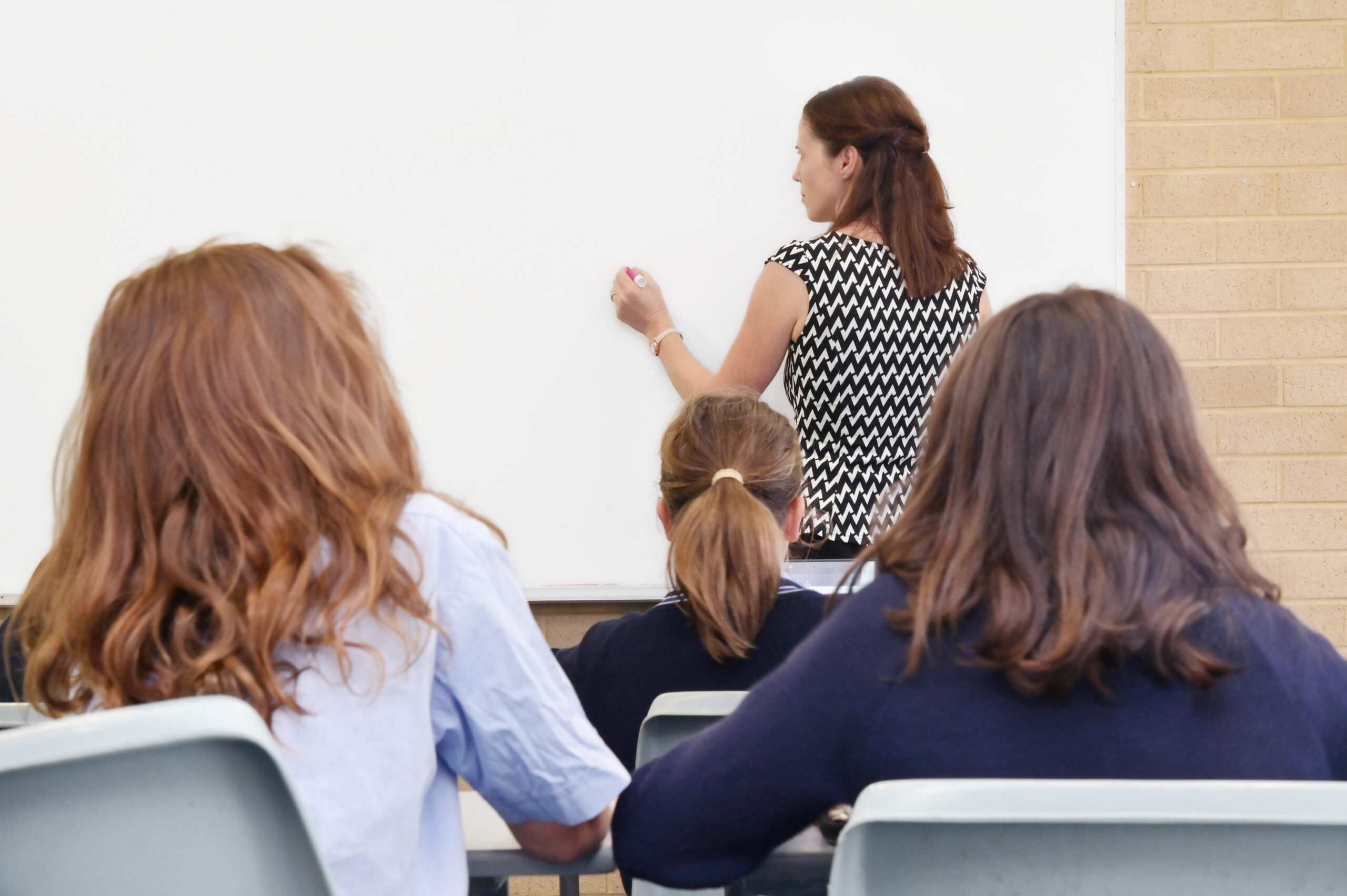 Teacher and Children in School Classroom - School Injury