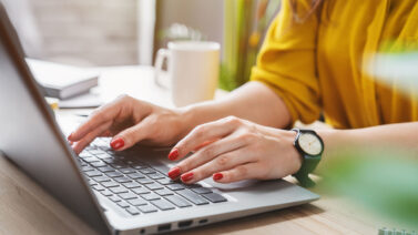 Woman working from home unaware of workers compensation entitlements.